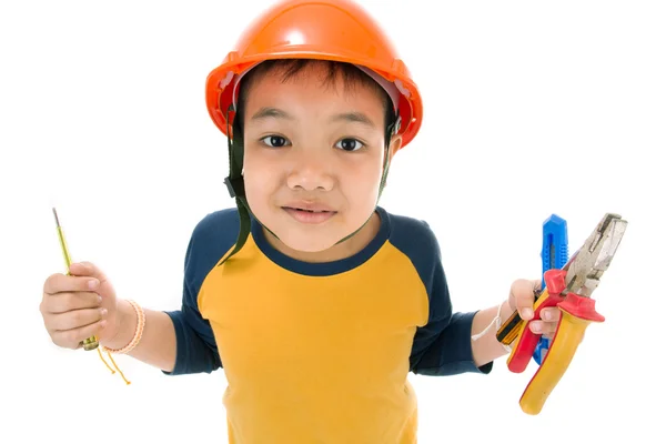 Joven asiático niño construcción trabajador holding equipo — Foto de Stock