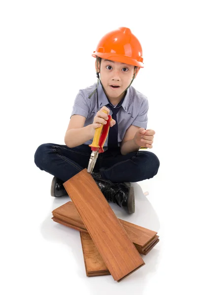 Jovem asiático criança engenheiro de construção Segurando equipamentos — Fotografia de Stock