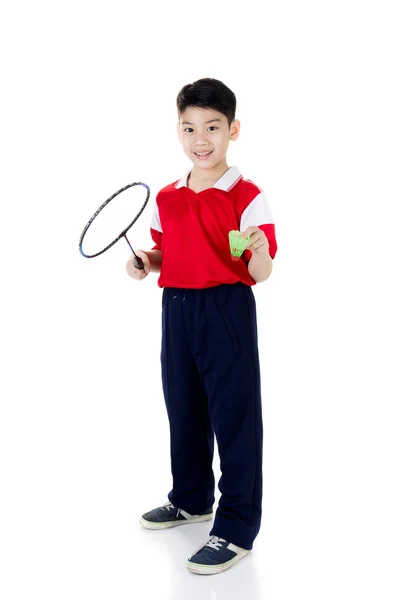 Aziatisch jongen in badminton actie — Stockfoto