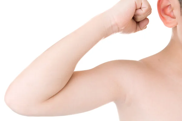 Strong Asian boy showing off his biceps flexing muscles his arm — Stock Photo, Image