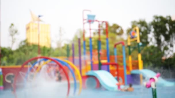 Colorful water park ,out of focus — Stock Video