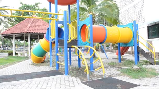 Asian cute boy playing in the park — Stock Video