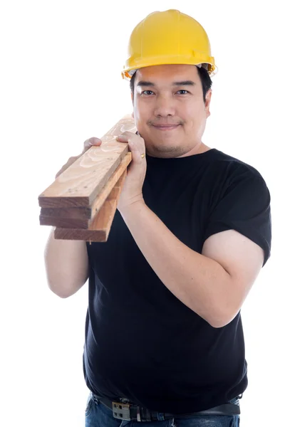 Portrait of asian smiling carpenter holding wood planks. — Stock Photo, Image