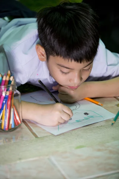 Happy asian boy painting and drawing  at home — Stock Photo, Image