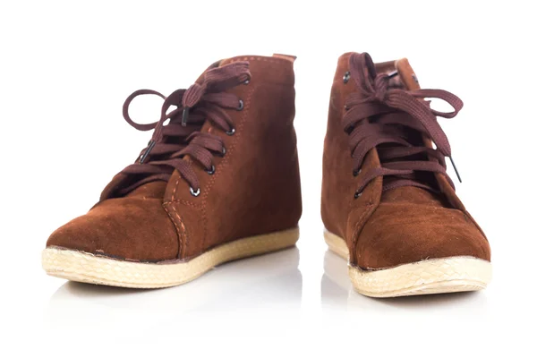 Paire de vieilles bottes de travail marron avec ombres — Photo