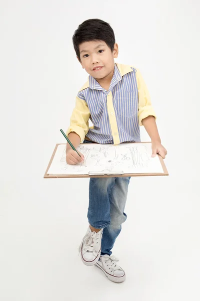 Menino asiático feliz segurando placa de arte — Fotografia de Stock