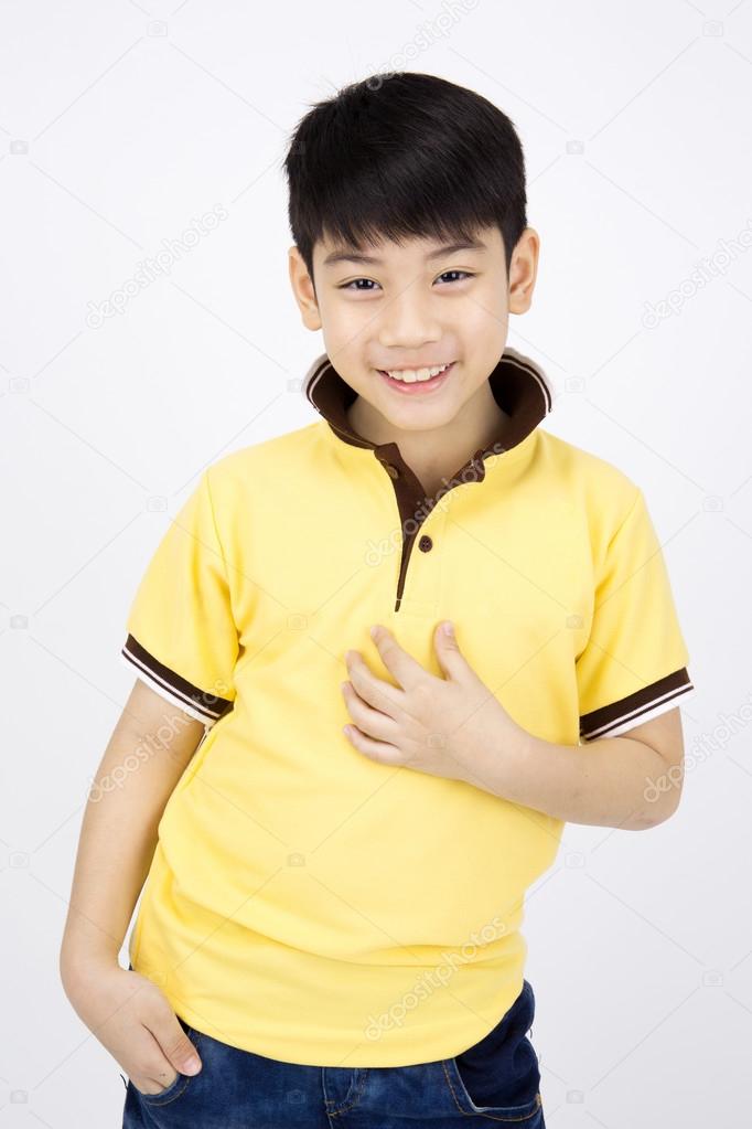 Portrait of asian happy boy smile face and looking at camera on 