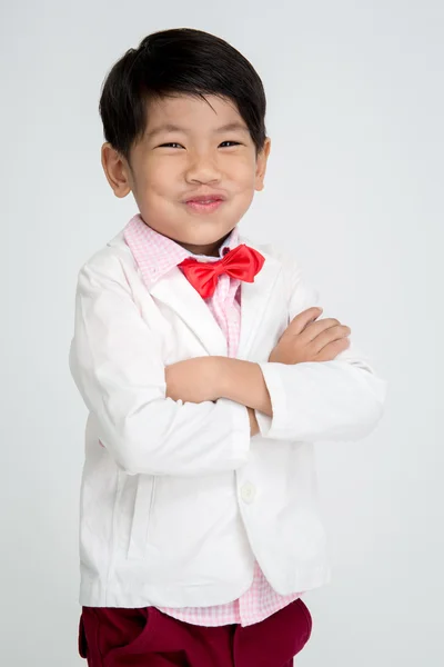 Piccolo asiatico ragazzo in vintage vestito con sorriso faccia — Foto Stock