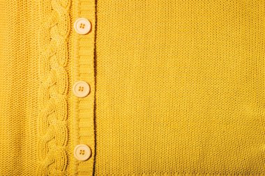Sarı kumaştan örülmüş bir arka plan