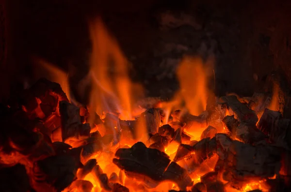 Hot coals in the fire — Stock Photo, Image