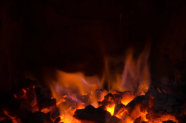 Hot coals in the fire — Stock Photo, Image