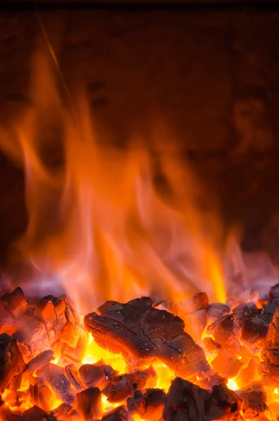 Hot coals in the fire — Stock Photo, Image