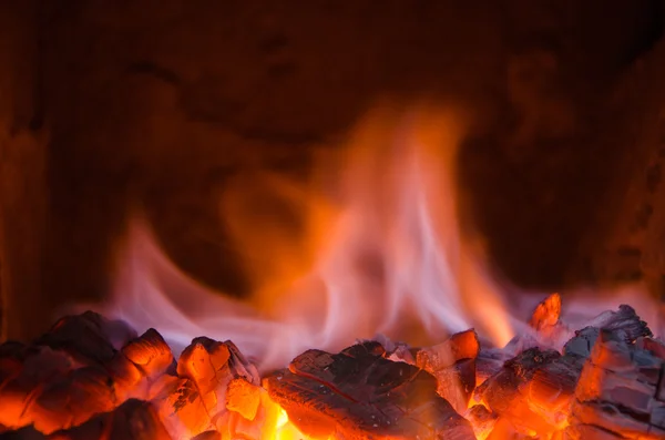 Hot coals in the fire — Stock Photo, Image