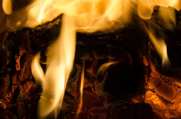 Hot coals in the fire — Stock Photo, Image