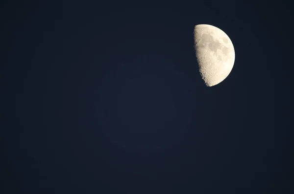 Waxing gibbous moon phase at night over Gran Canaria.