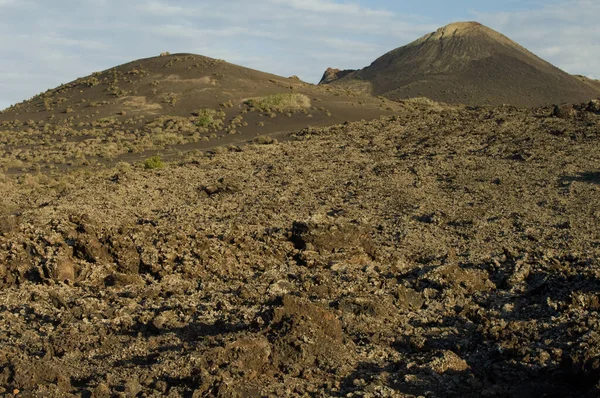 Paisaje volcánico en el Parque Natural de Los Volcanes. —  Fotos de Stock