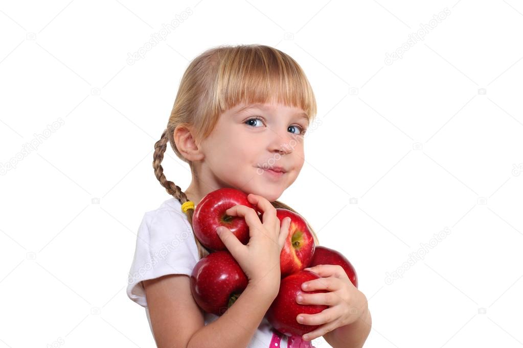 child holding apples