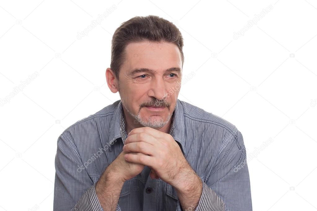 thinking age man beard with grey shirt