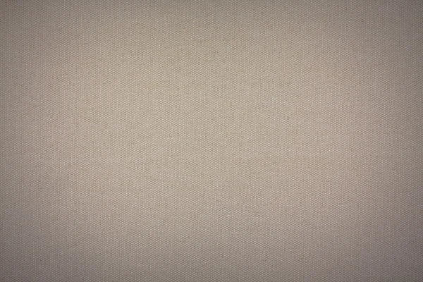 Hintergrund Textur beige Stoff Nahaufnahme mit Vignette — Stockfoto