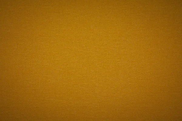 Background texture of dark orange fabric closeup with vignette — Stock Photo, Image