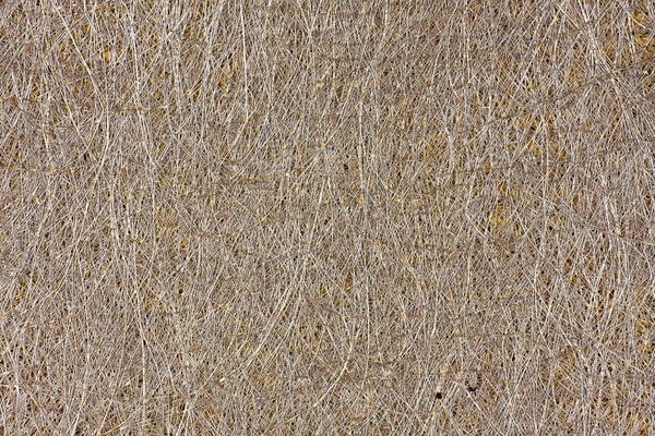 Contexto ou textura de pedaços de fibra no painel de cortiça — Fotografia de Stock