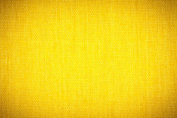 Background texture of yellow fabric closeup with vignette — Stock Photo, Image