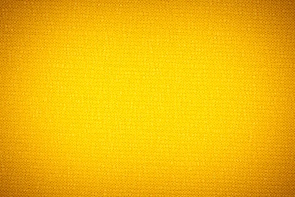 Background texture of yellow fabric closeup with vignette — Stock Photo, Image