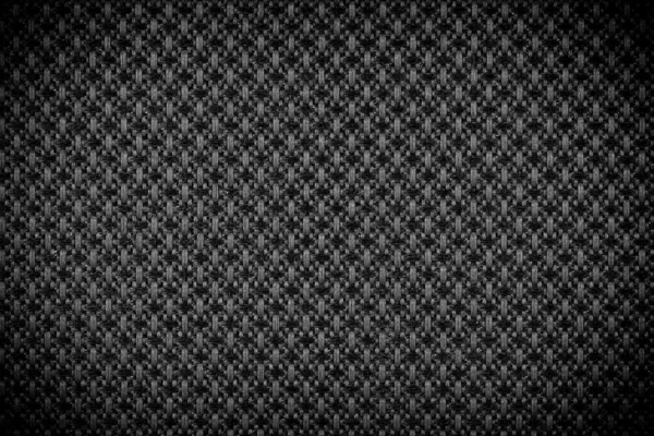 Achtergrond textuur van donkere zwarte stof close-up met vignet — Stockfoto