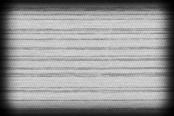 Hintergrund Textur aus schwarzem und weißem Stoff Nahaufnahme mit Vignette — Stockfoto