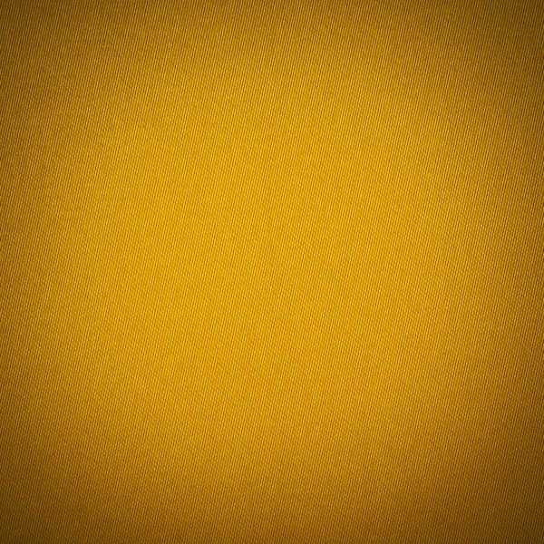 Bakgrundsstruktur av gult tyg närbild med vinjett — Stockfoto