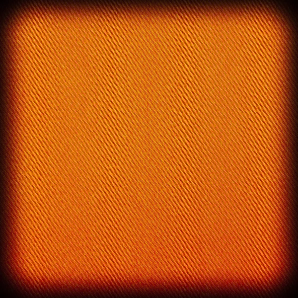 Background texture of orange fabric closeup with vignette — Stock Photo, Image