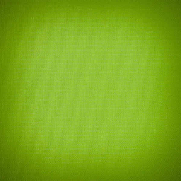 Фон текстуры зеленой ткани крупным планом с виньеткой — стоковое фото