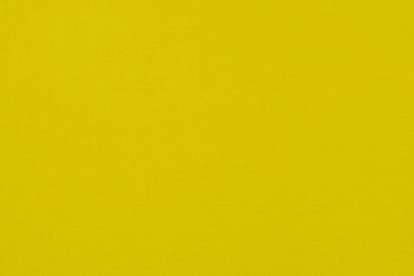 Achtergrond textuur van gele stof close-up — Stockfoto