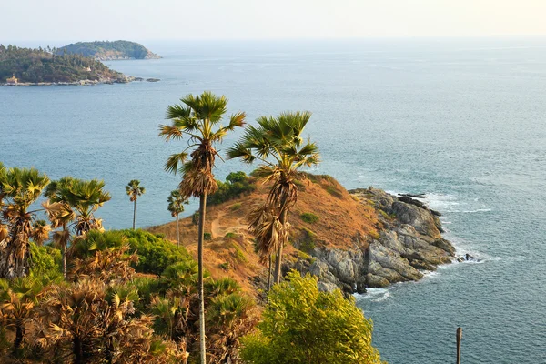 Promthep Cape is a mountain of rock that extends into the sea — Stock Photo, Image