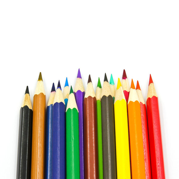 Colored pencils isolated on white background.