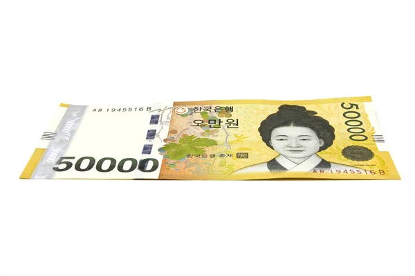 Банкноты корейской вон, изолированные на белом фоне. — стоковое фото