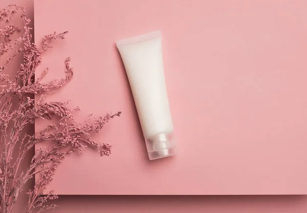 Cosmetic Cream Tube Packaging Platform Flower Branch Pastel Pink Background — Stockfoto