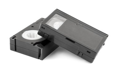 VHS-C video cassettes on white background clipart