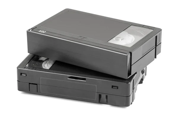 Cassetes de vídeo VHS-C em fundo branco — Fotografia de Stock