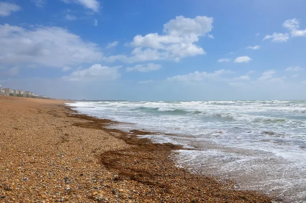 Kiezelstrand in Brighton op een winderige dag — Stockfoto