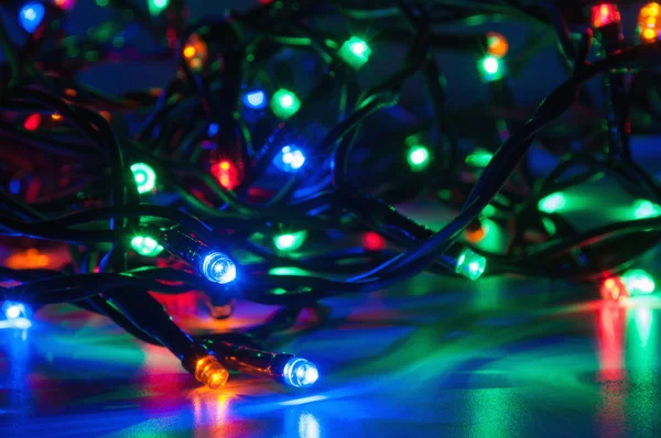 Christmas lights on dark background — Stock Photo, Image