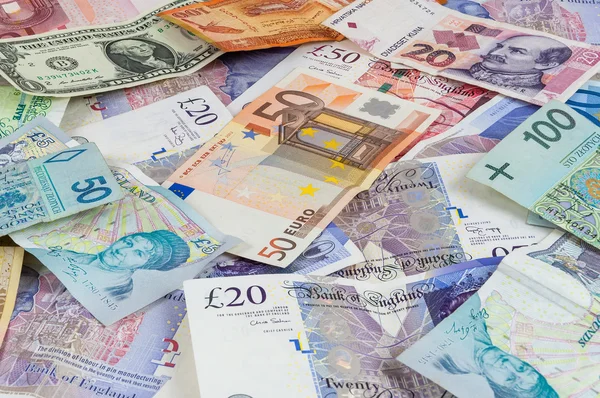 Different currencies banknotes background — Stock Photo, Image