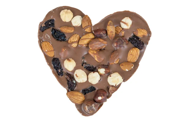 Heart shaped chocolate with nuts on white background — Stock Photo, Image