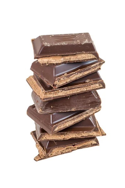 Heap of chocolate pieces on white background — Stock Photo, Image