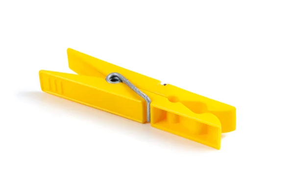 Yellow plastic clothespin — Stock Photo, Image