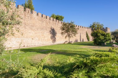 The ancient city walls of Evora clipart
