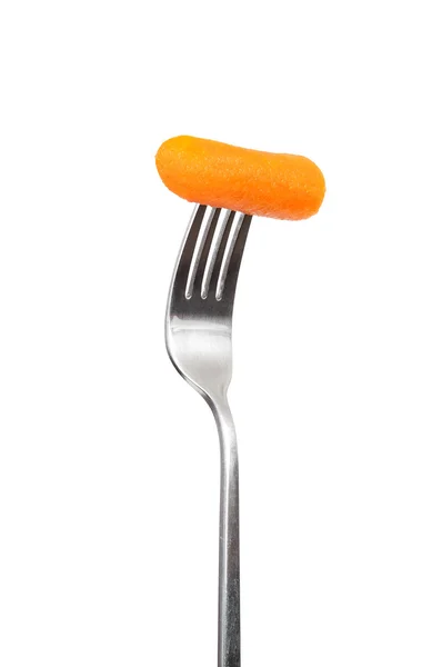 Маленькая морковка на вилке — стоковое фото