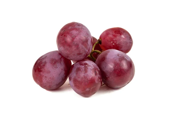 Gäng röda druvor på vit bakgrund — Stockfoto
