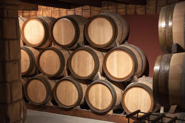 Wooden barrels in the cellar — Stock Photo, Image