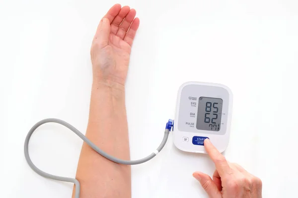 Man Measures Blood Pressure White Background Arterial Hypotension Hand Tonometer — Fotografia de Stock